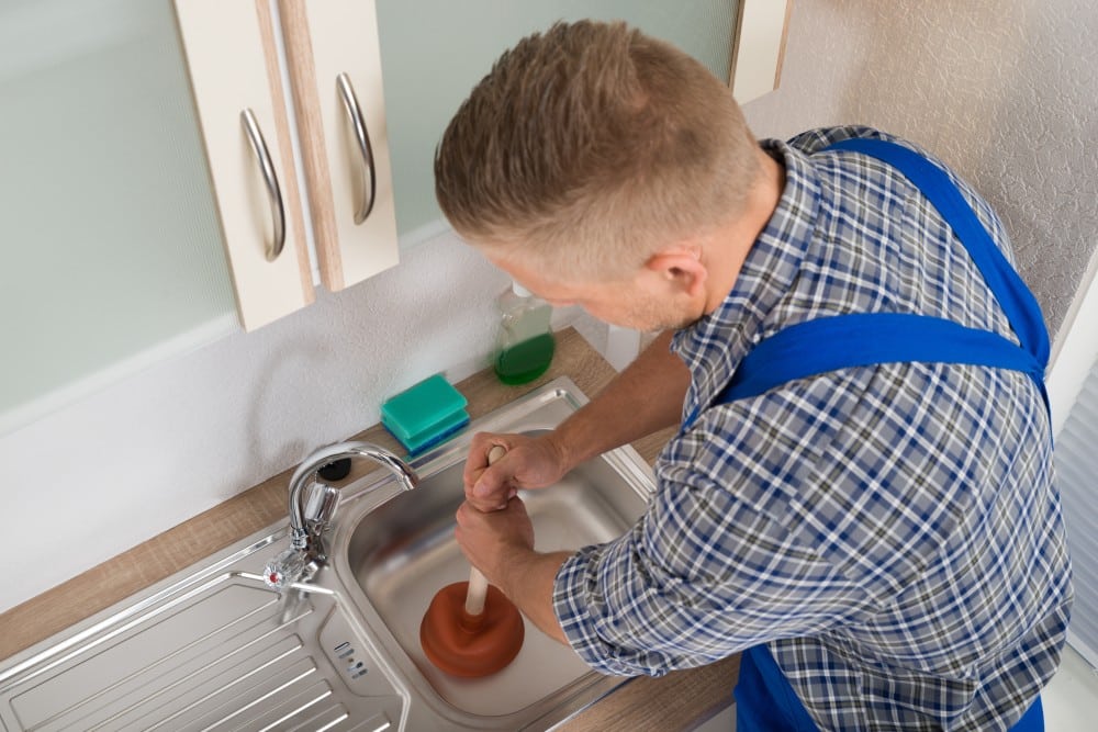 Who Should I Call to Fix a Blocked Sink: Plumber or DIY